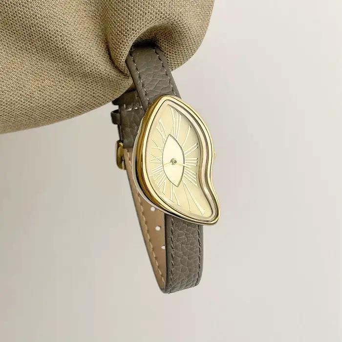 Montre créative rétro haut de gamme pour femmes, cadran torsadé irrégulier, montre à quartz en cuir 