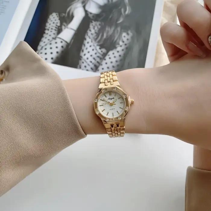 Mode femme chambre ronde or bracelet en acier Quartz montre-bracelet de luxe dames montre dorée pour