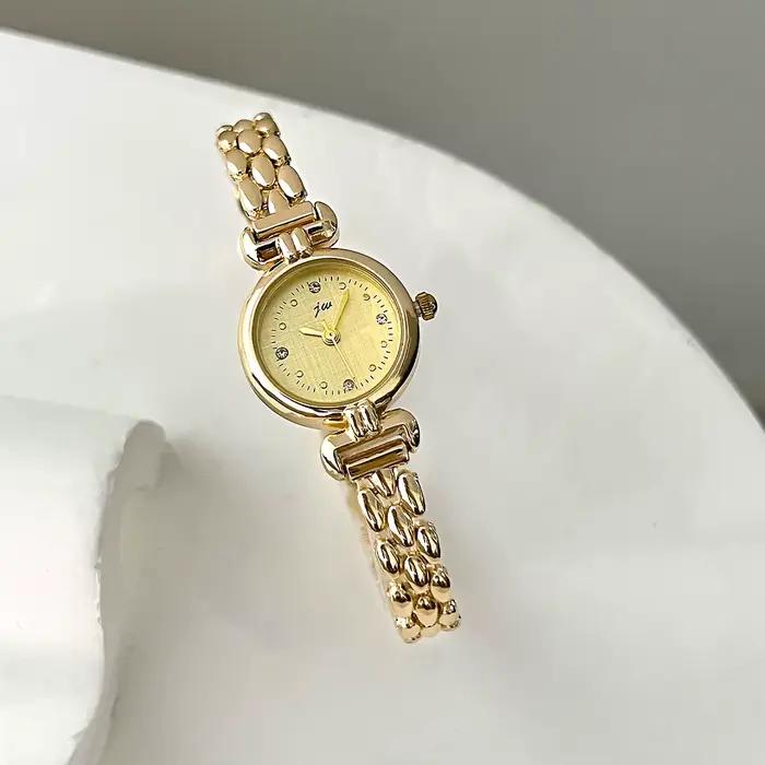 Montre pour femme rétro Bracelet montres petit et exquis polyvalent ceinture en acier dames mode Qua