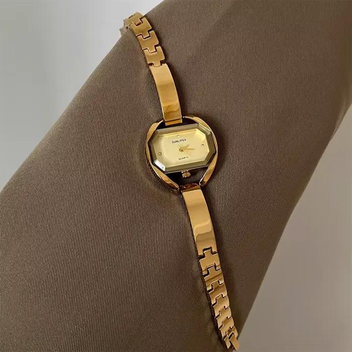 Femmes élégantes montre à Quartz horloge classique délicate ceinture en acier Bracelet mode dames mo