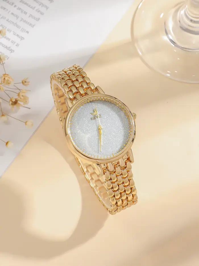 Montre de luxe dorée pour femme, cadran étoilé étincelant avec bracelet en acier inoxydable de quali