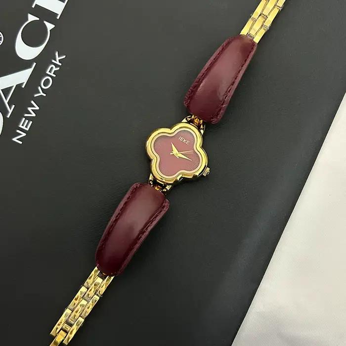 Montre à quartz pour femmes et filles, cadran or et argent, en acier inoxydable, style bracelet simp