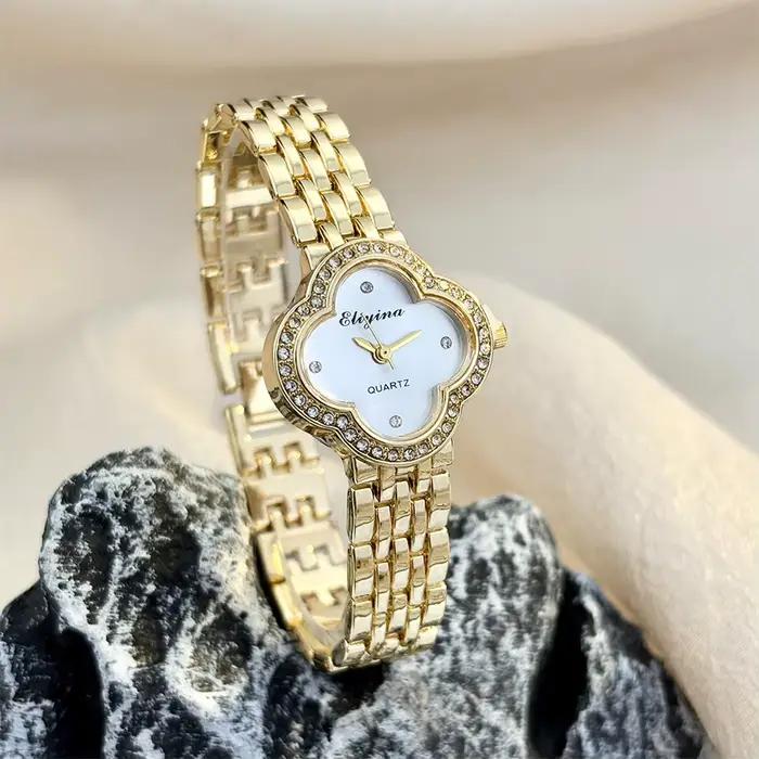 Montre vintage en or avec trèfle délicat pour femmes, verre convexe