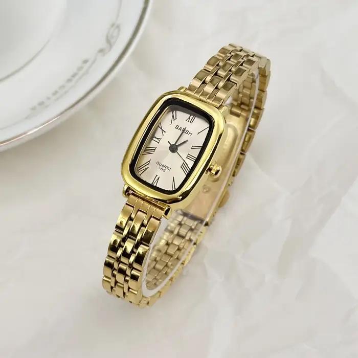 Montre en or avec ceinture en acier pour femme, montre à quartz vintage, montre-bracelet pour femme,