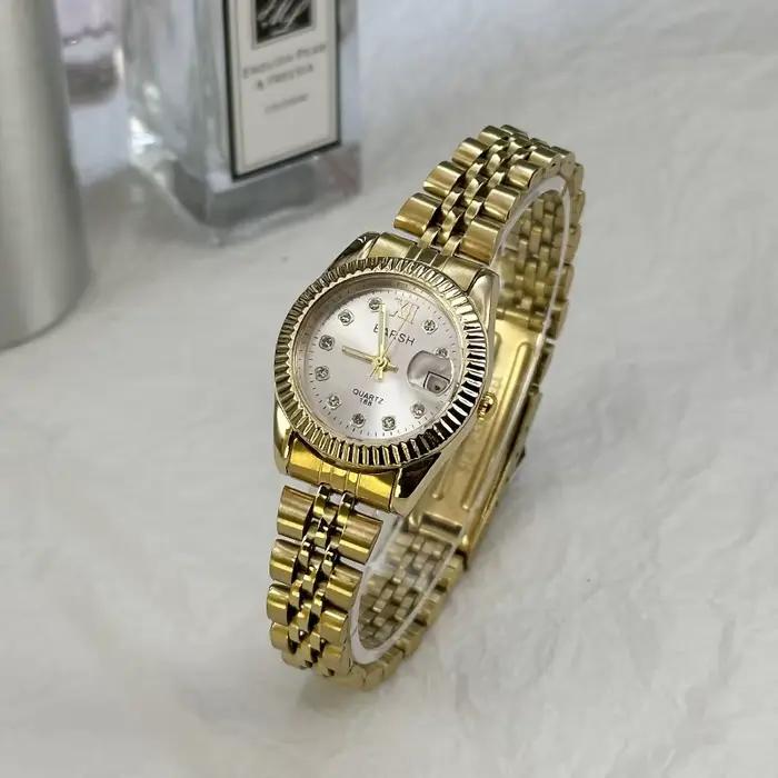 Bande d'acier dorée montre pour femme diamant clouté calendrier montre décontracté dames montre à Qu