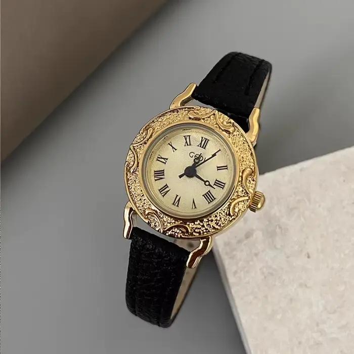 Montre pour femme Vintage lunette gravée en or chiffres romains montre à Quartz montre-bracelet élég