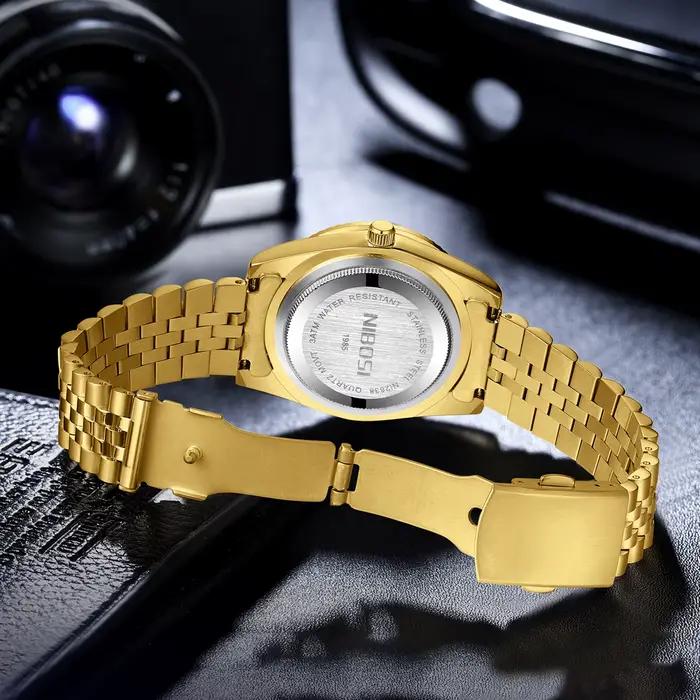 Montre NIBOSI en acier inoxydable avec fonction date et résistance à l'eau pour homme style luxueux affaires et occasions spéciales