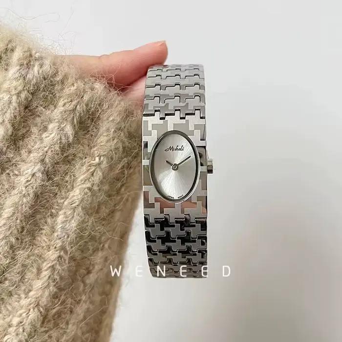 Montre en argent avec bracelet en acier inoxydable pour femme