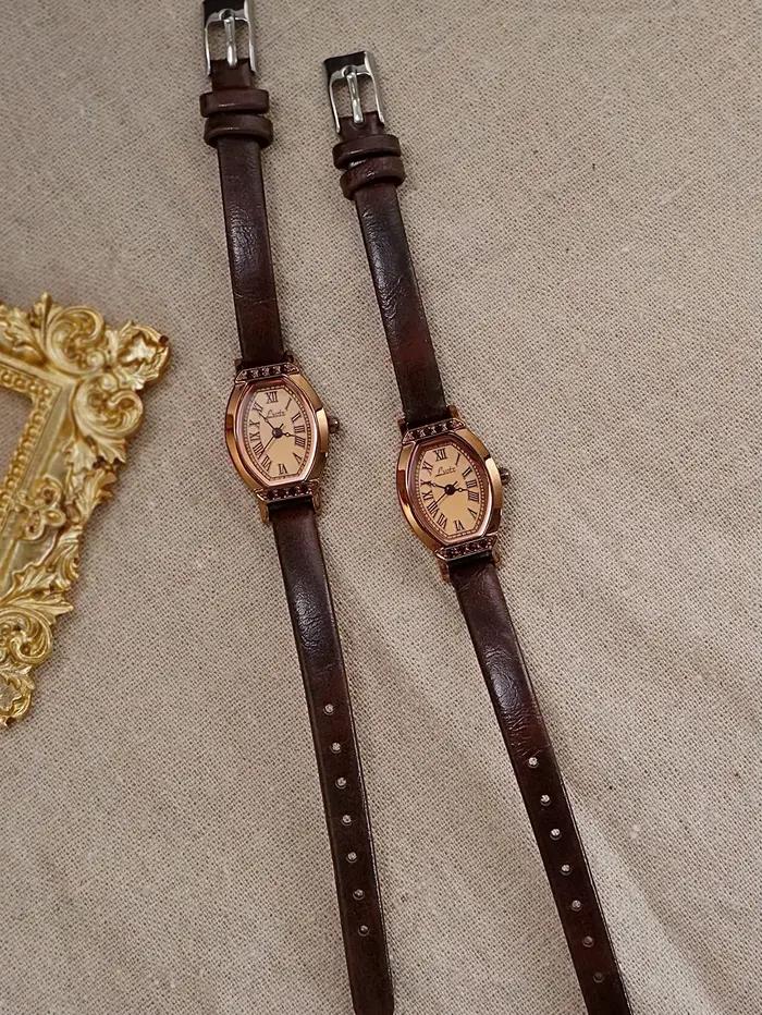 Montre rétro décontractée et élégante pour femme en forme de baril avec cadran en strass pour usage quotidien et soirées élégantes