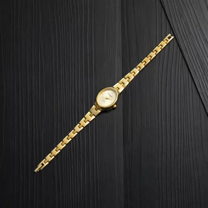 Montre en or JBAILI pour femme élégante avec cadran ovale mouvement quartz occasion spéciale cadeau