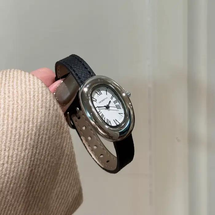 Montre à quartz ovale minimaliste pour femme