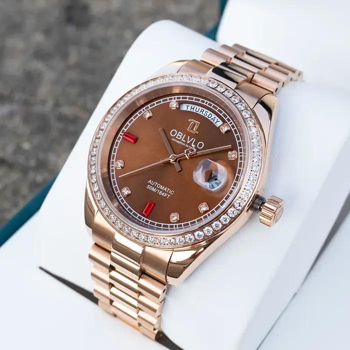 Montre automatique de luxe homme cadran marron bracelet or rose date avec résistance à l'eau et affichage lumineux pour occasions spéciales