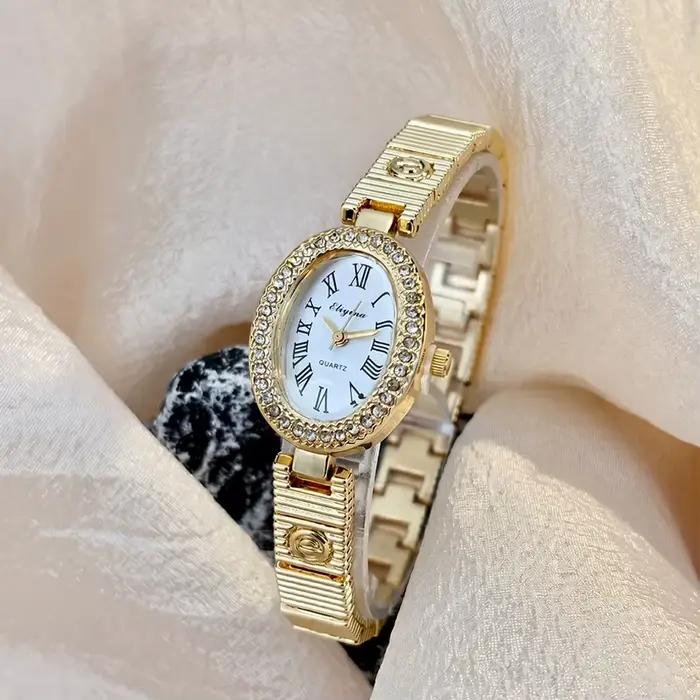 Montre élégante ovale pour femme avec lunette sertie de diamants et bracelet E-Design
