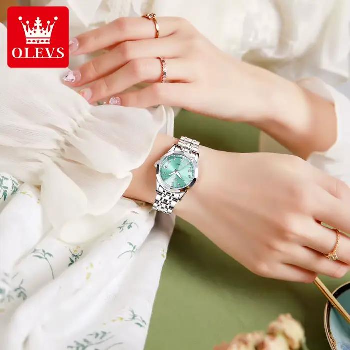 OLEVS 9931 montre élégante pour femmes en acier inoxydable calendrier