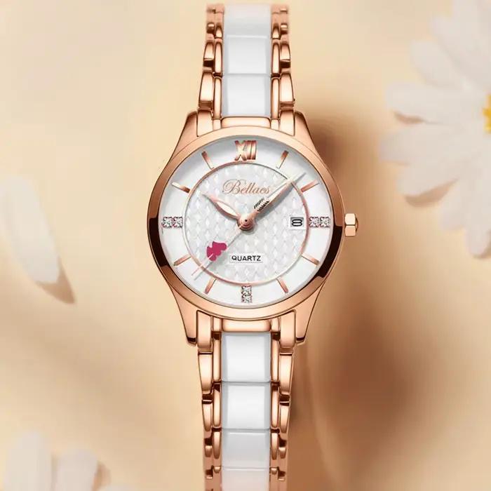 Montre ronde en acier inoxydable quartz pour femme résistante à l'eau avec pointeur cœur pour occasions spéciales et quotidien
