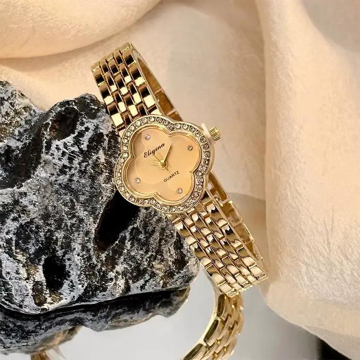 Montre vintage en or avec trèfle délicat pour femmes, verre convexe