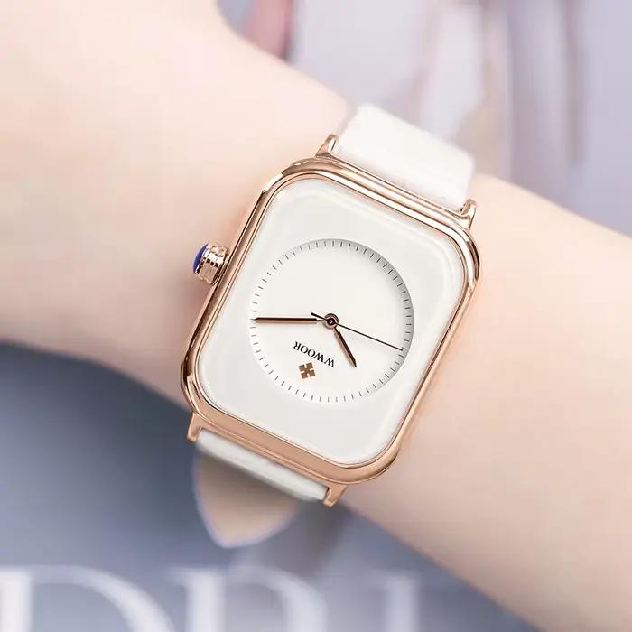 Montre bracelet rectangulaire en cuir blanc pour femmes résistante à l'eau et élégante pour diverses occasions sociales et quotidiennes