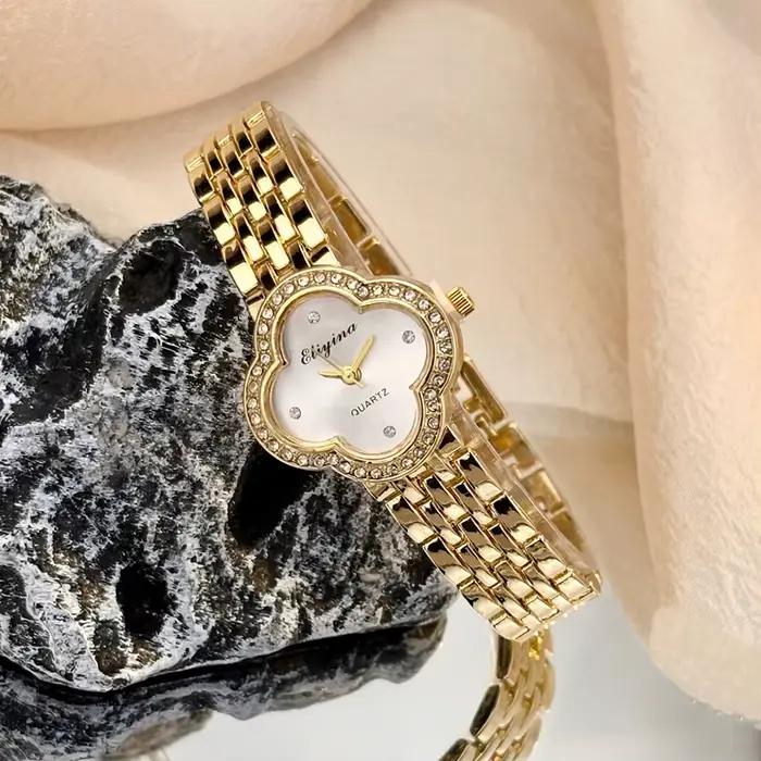 Montre vintage en or avec trèfle délicat pour femmes, verre convexe