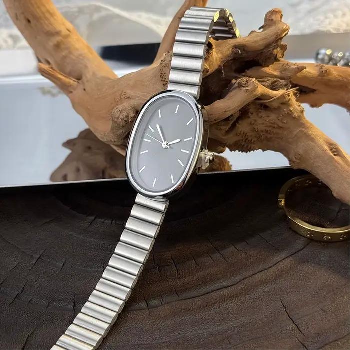 Nouvelle montre à Quartz elliptique de mode rétro dorée dames bracelet en acier