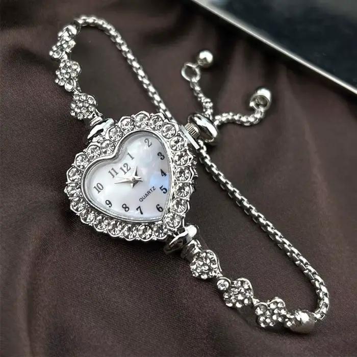 Nouvelles montres à Quartz en acier inoxydable montre en forme de coeur avec Bracelet réglable femmes montre-Bracelet décoration de poignet exquise