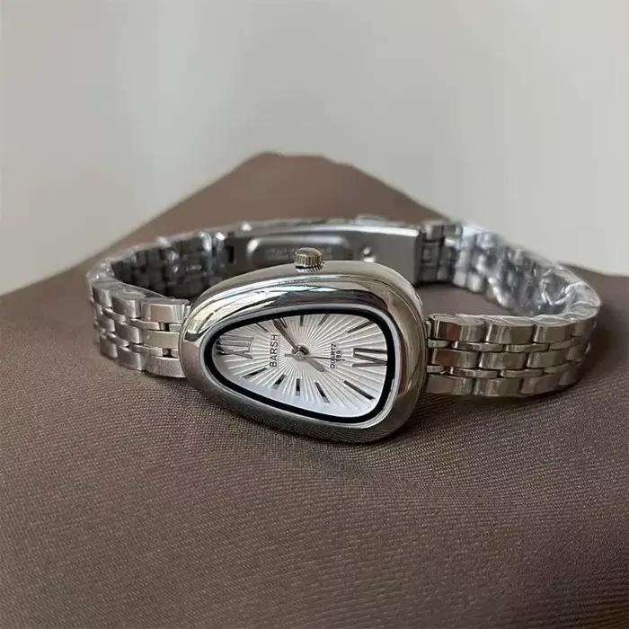 Marque serpent tête cadran femmes montre de luxe dames montres à Quartz en forme de gouttelette chiffre romain bracelet