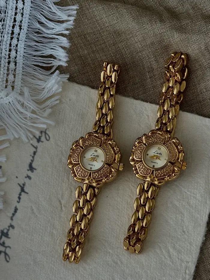 Montre Camélia dorée rétro élégante pour femmes occasions spéciales mode bracelet alliage quartz résistant à l'eau