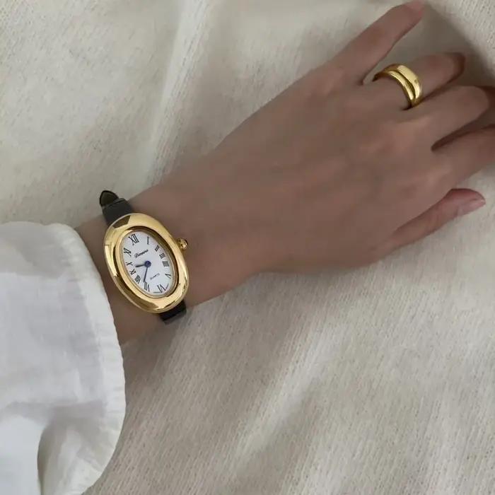 Dimeina femmes montre à Quartz de haute qualité forme ovale Orologio luxe or acier inoxydable horloge dames montre-bracelet en cuir noir
