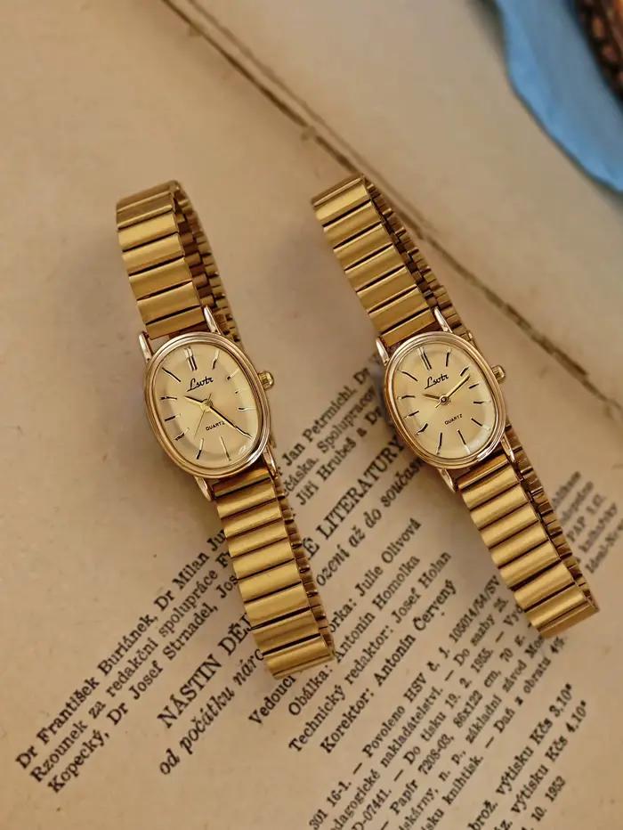 1 nouvelle montre à quartz dorée pour femme, style rétro luxueux, boîtier ovale et bracelet en cuir, montre élégante et polyvalente pour femme.