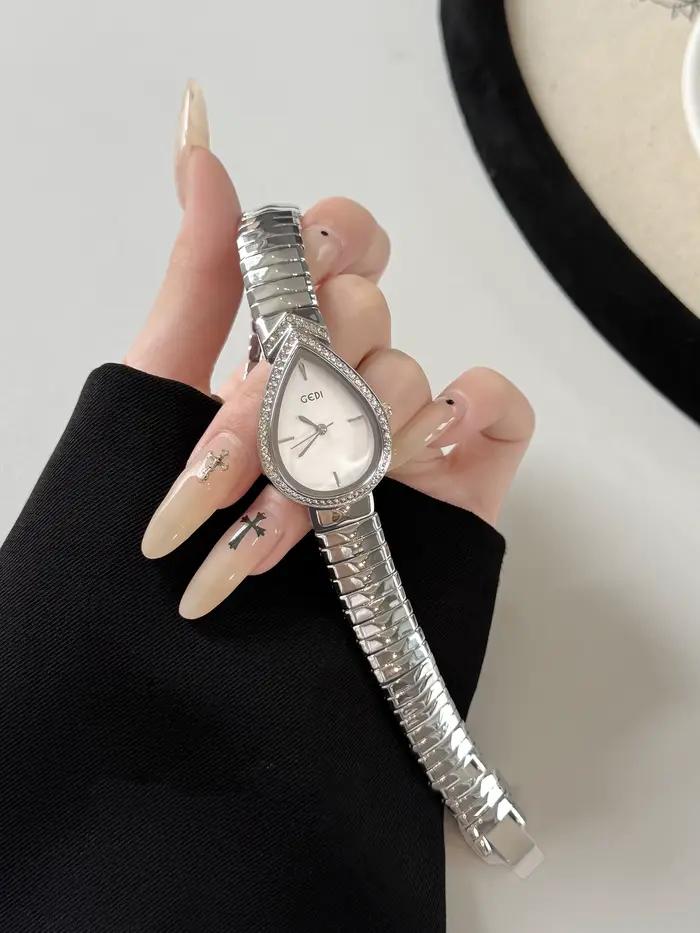 GEDI Nouvelle montre créative vintage pour femme avec cadran en forme de larme clouté de diamants