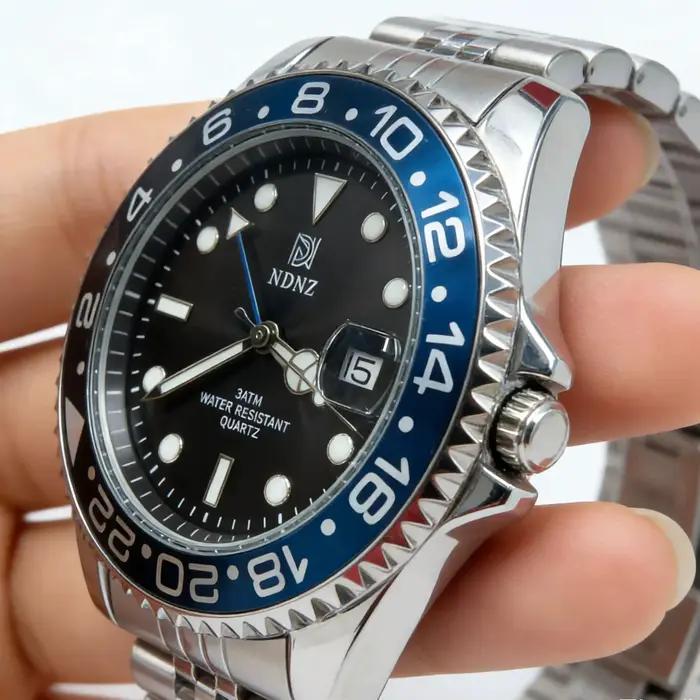 Montre à quartz NDNZ GMT avec lunette rotative 24H, bracelet en acier inoxydable, résistante à l'eau pour homme occasions spéciales