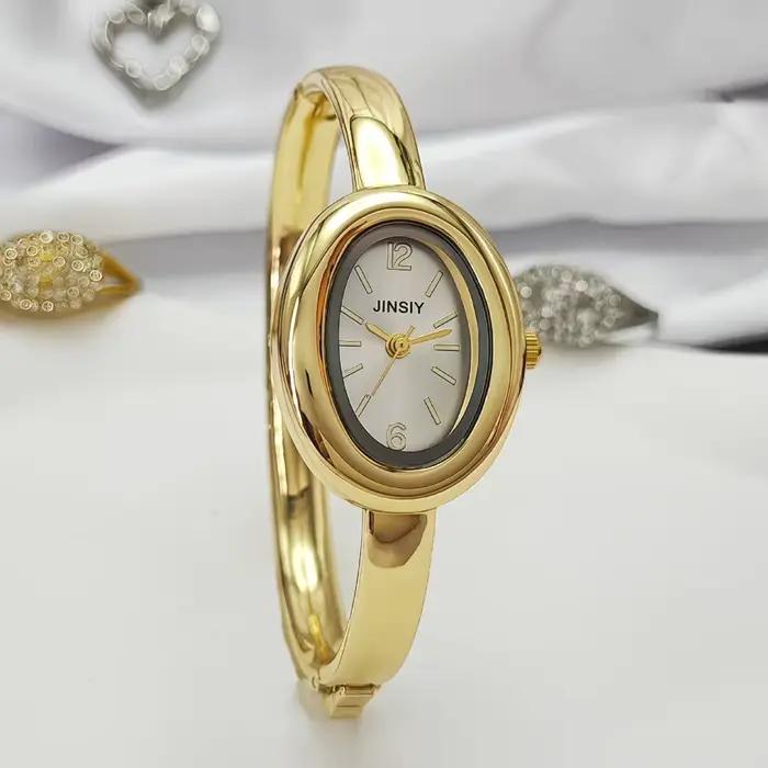 Montre-bracelet dorée en alliage avec bracelet en acier inoxydable pour femmes élégantes occasions spéciales style mode et décontracté