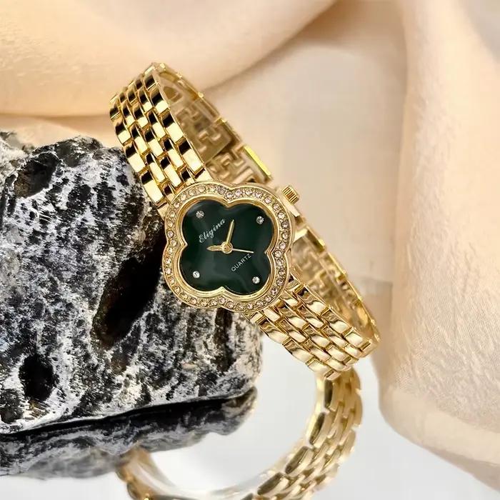 Montre vintage en or avec trèfle délicat pour femmes, verre convexe