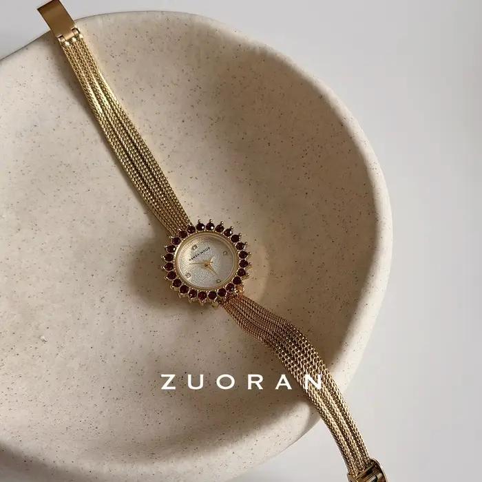 Montre de luxe pour femme élégante et sophistiquée mode décontracté quartz bracelet alliage bronze occassions spéciales