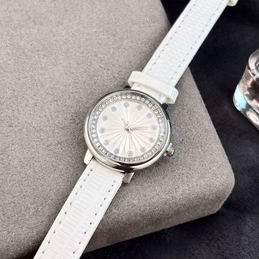 Montre pour femmes : Cadran à motif de feux d'artifice circulaires, bracelet en cuir, montre classiq
